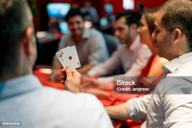 Group Of People Playing Blackjack At The Casino Stock Photo - Download Image Now - Playing, Poker - Card Game, Men