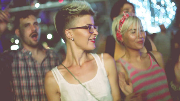 istock Seductive dancing two attractive hipster ladies 909360976