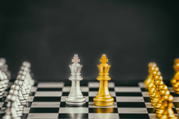 istock Strategy chess battle Intelligence challenge game on chessboard. Success the strategy concept. Chess business leader and success idea. Chess strategy game business competition success play. 909363440