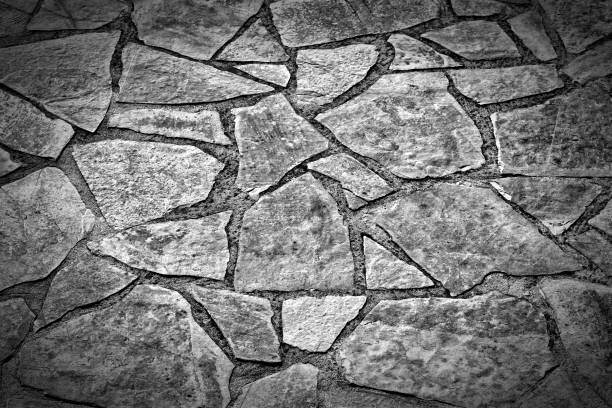 background texture of old black-and grey masonry stones