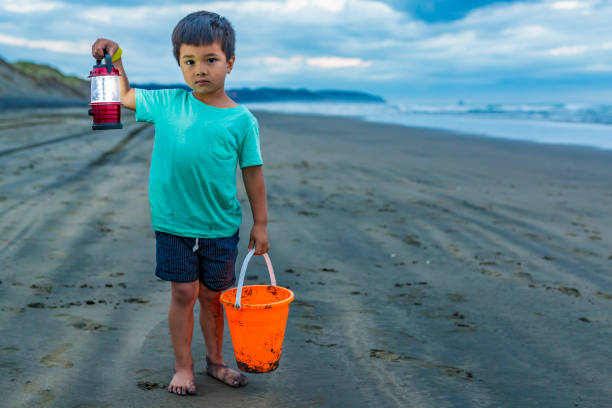 Little boy enjoying vacations near the sea