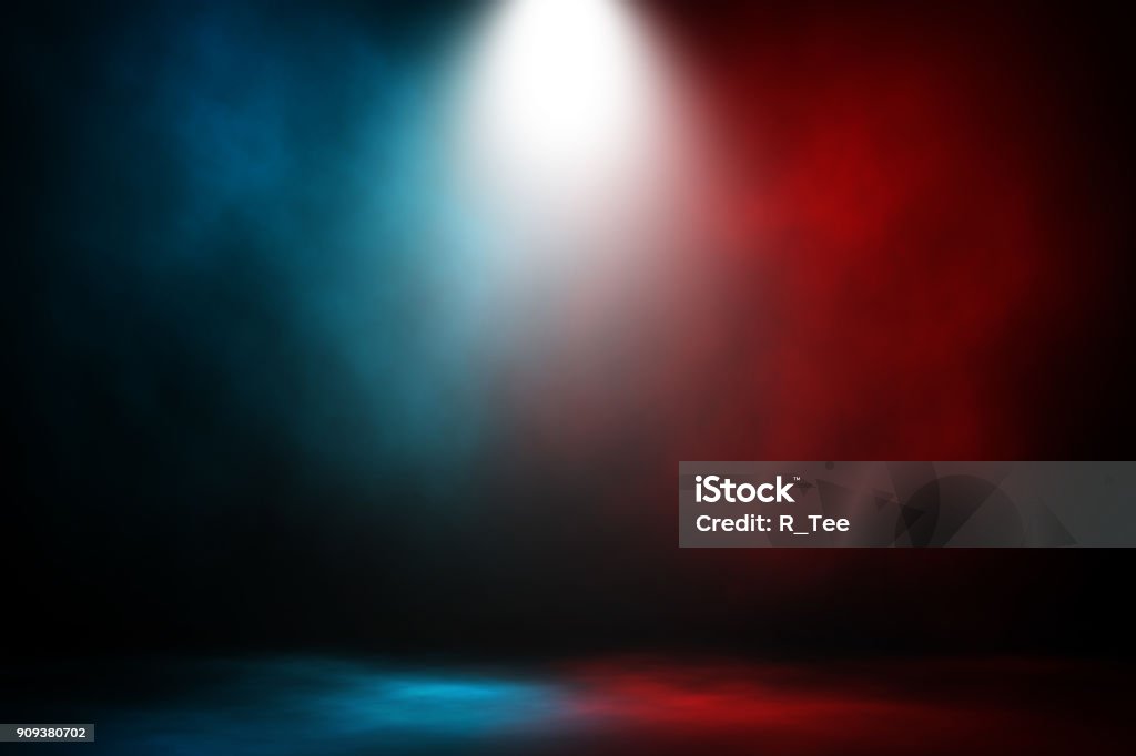 Spotlight fight and match red and blue smoke background. Red Stock Photo