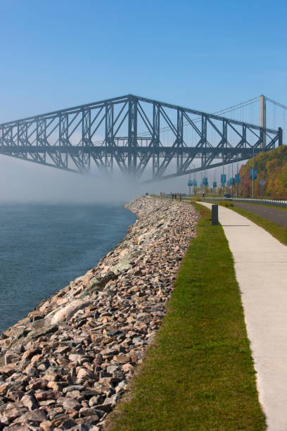 istock Old Quebec bridge in fog. 909381032