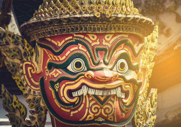 istock Giant statues in temple with sun light,Bangkok, Thailand. 909388024