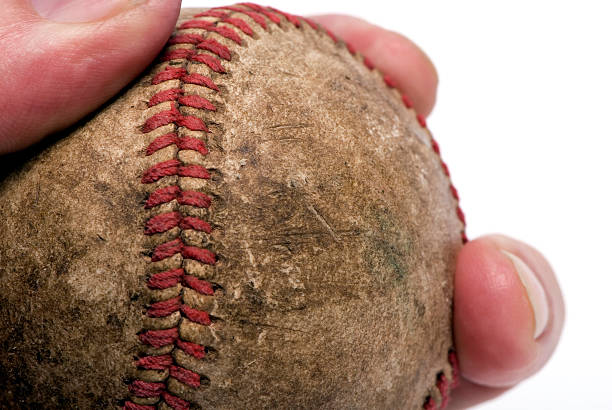 保持野球 2 - baseball baseballs isolated dirty ストックフォトと画像