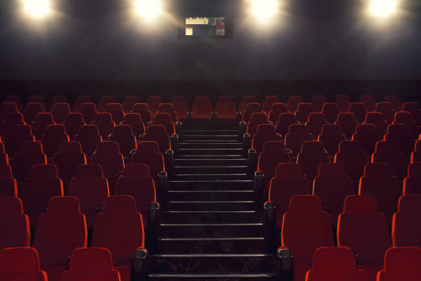 Cinema city seats room and lights projectors stock photo
