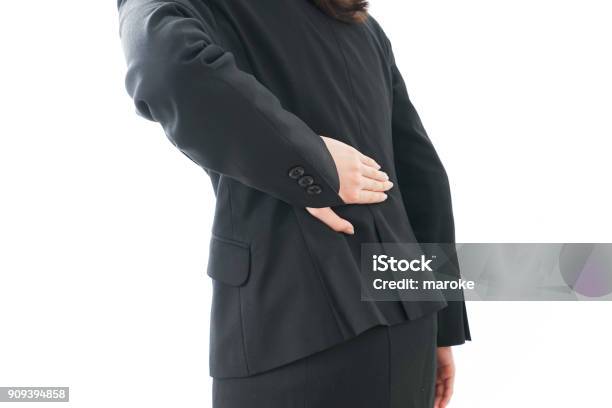 Casual Shy Man In A Black Suit Jacket And Jeans Stock Photo - Download Image Now - Adult, Adults Only, Backgrounds - iStock