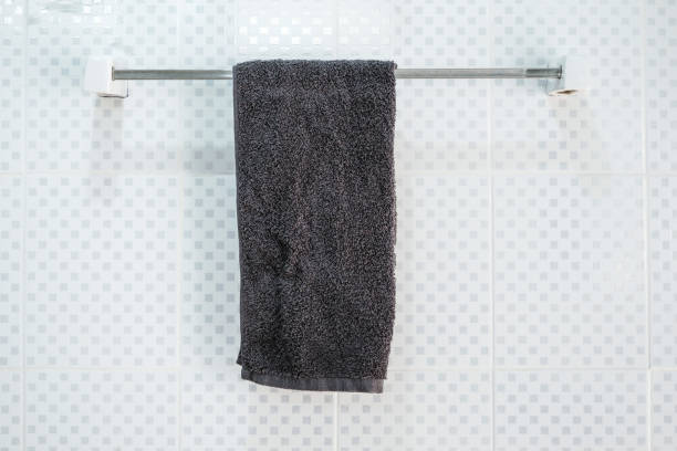 istock Bathroom interior and towel hanging on a railing 909395890