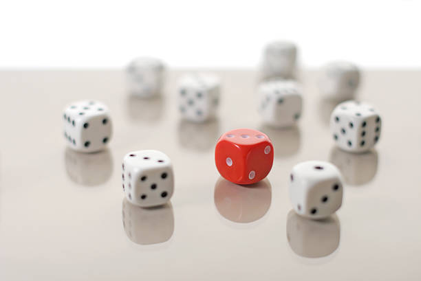 istock One red dice among many white dices 90939804