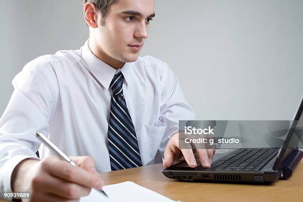 Young Businessman Or Student At The Table With Laptop Stock Photo - Download Image Now