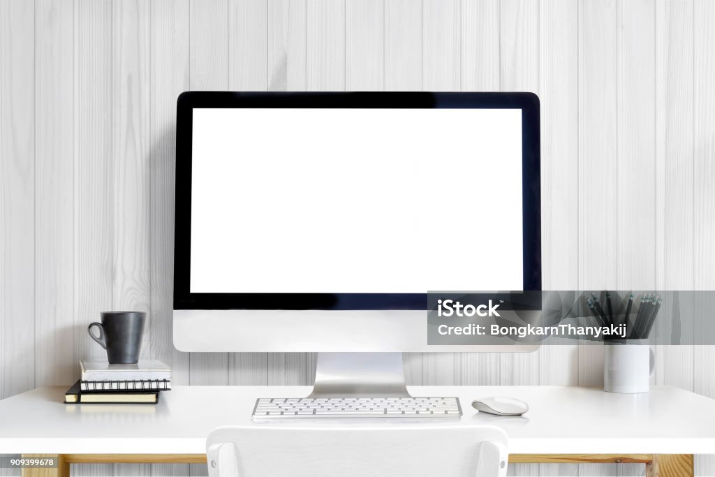 Modern creative designer workplace with desktop computer on white table. Mockup Computer Stock Photo