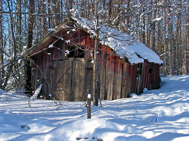 Old house covered with snow stock photo