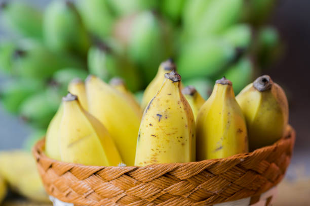 istock yellow banana in basket 909403492