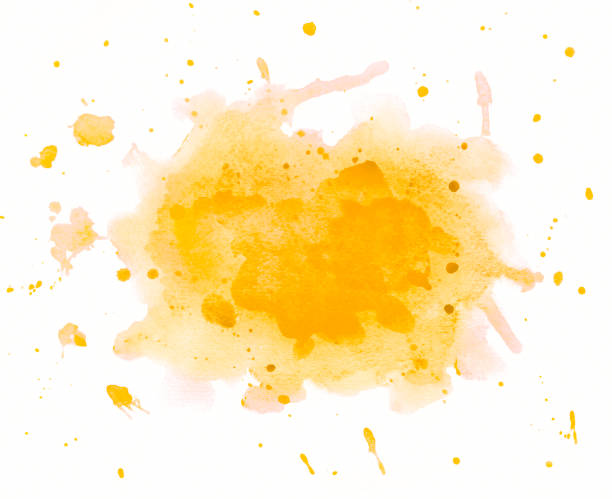 istock Yellow watercolor background splatter on white 909404124