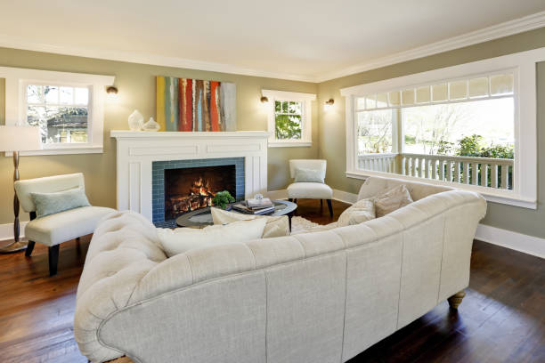 istock Chic green living room with a traditional fireplace. 909406846