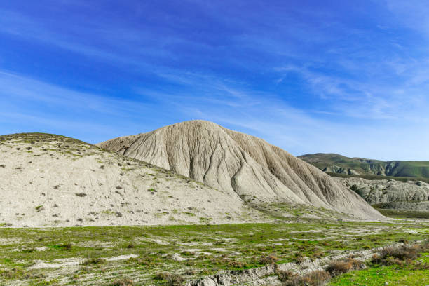 istock Hilly mountains in the valley, mountain landscape 909407090