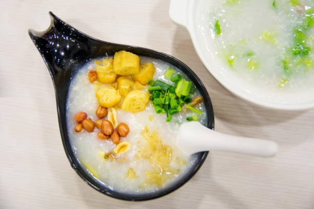 istock Chinese Tingzai rice porridge served in a restaurant 909413282