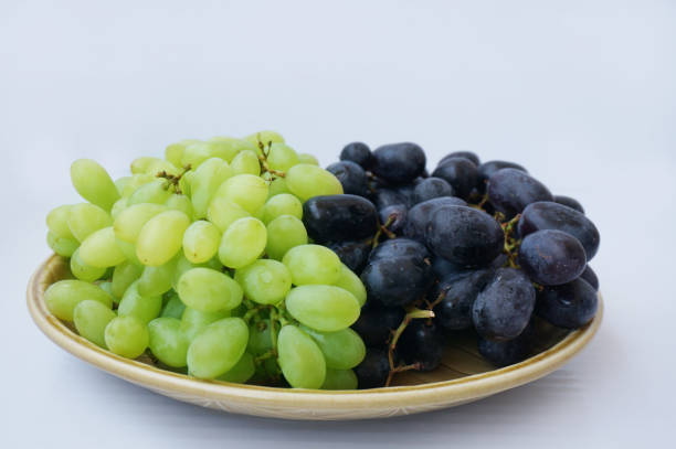 istock Closeup of Fresh grape on plate 909414870