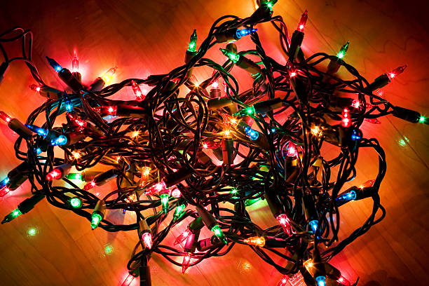 tight bundle von christmas lights - verheddert stock-fotos und bilder