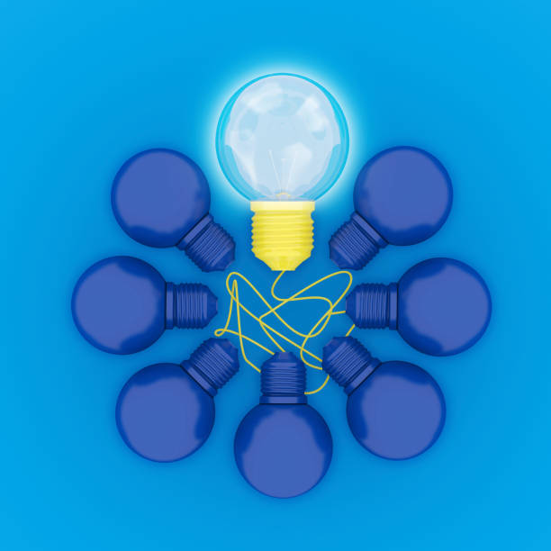 istock Abstract different yellow pastel Light bulbs glowing with circle shape on dark blue background, minimal concept. top view 909415868