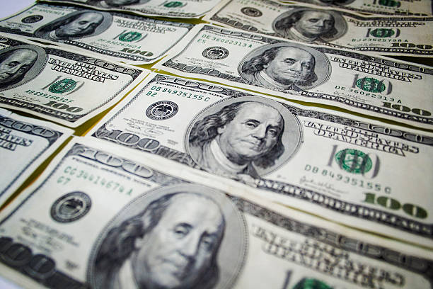 istock rows of hundred dollar bills 90941589
