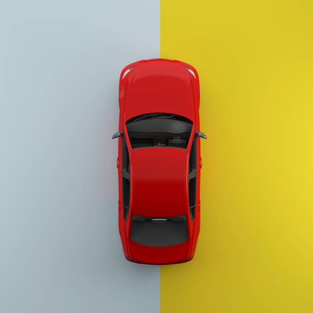 istock Red car on pastel blue and yellow contrast background. top view. minimal concept idea. 909415968