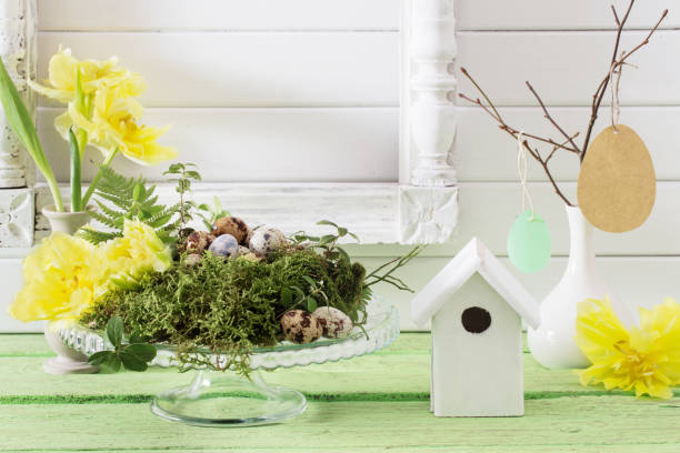istock Easter decoration on wooden background 909415998