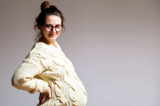 istock beautiful woman on last pregnancy 909416296
