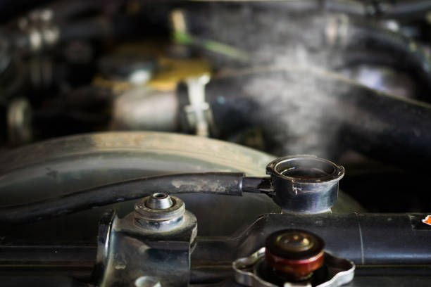Hot steam coming out of Radiator, Car engine over heat. Hot steam coming out of Radiator, Car engine over heat. overheated photos stock pictures, royalty-free photos & images