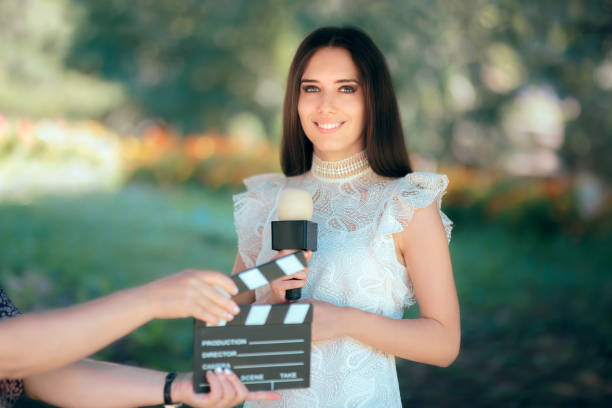 Professional Female Talent Auditioning for Movie Film Video Casting Woman reading her part on a microphone for a role spokesmodel stock pictures, royalty-free photos & images