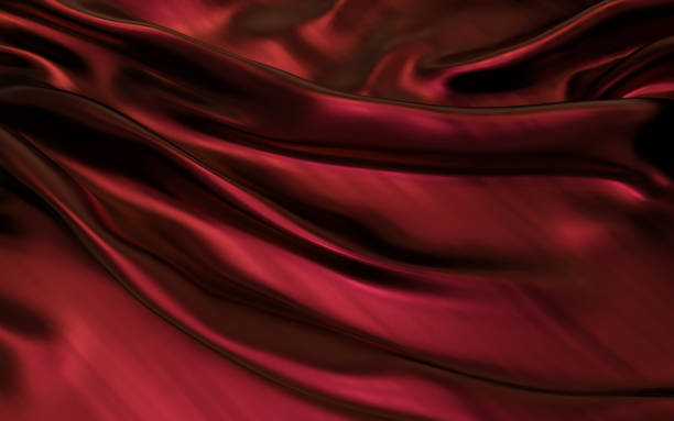istock Red or crimson satin cloth abstract background 909423756
