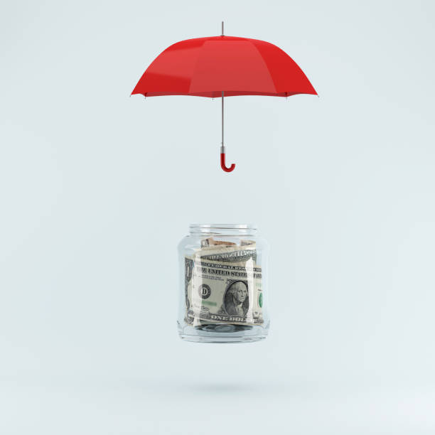 istock Protecting money concept by red umbrella on pastel blue background. minimal concept idea.  Business concept 909424724
