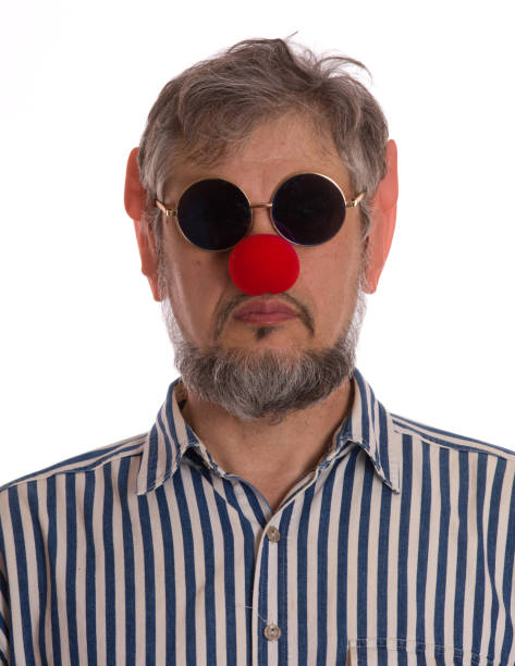 istock man with a red nose, Red Nose Day 909428542