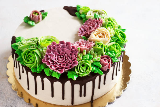 Birthday cake with flowers rose on white background. Malaysian flowers