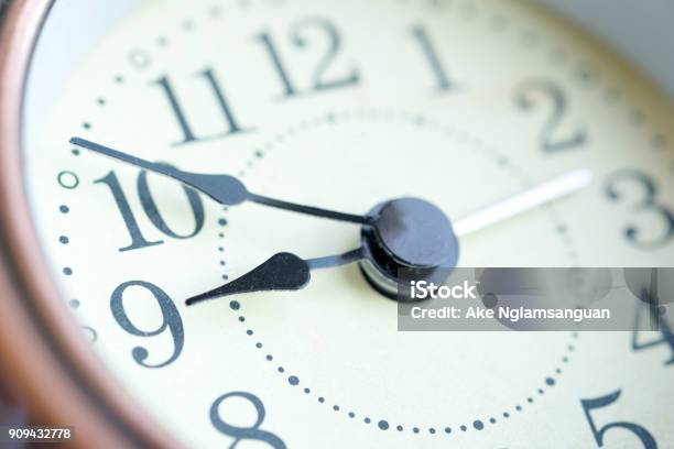 The Image Of The Alarm Clock Face Nine Oclock - Fotografias de stock e mais imagens de Relógio - Relógio, Tempo, Novo