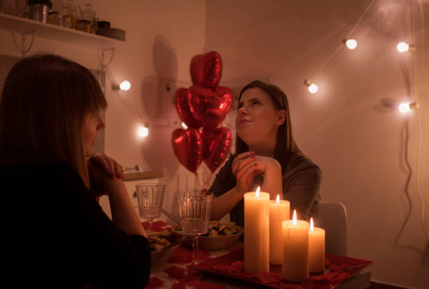 istock Lesbian couple celebrating Valentine's day 909436116