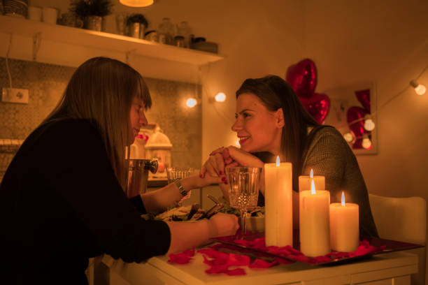istock Lesbian couple celebrating Valentine's day 909437044