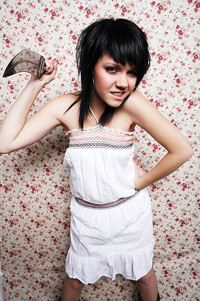 istock Female Holding Knife Portrait 90944065