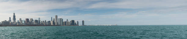 istock Chicago skyline panorama with skyscrapers over Lake Michigan wit 909443430