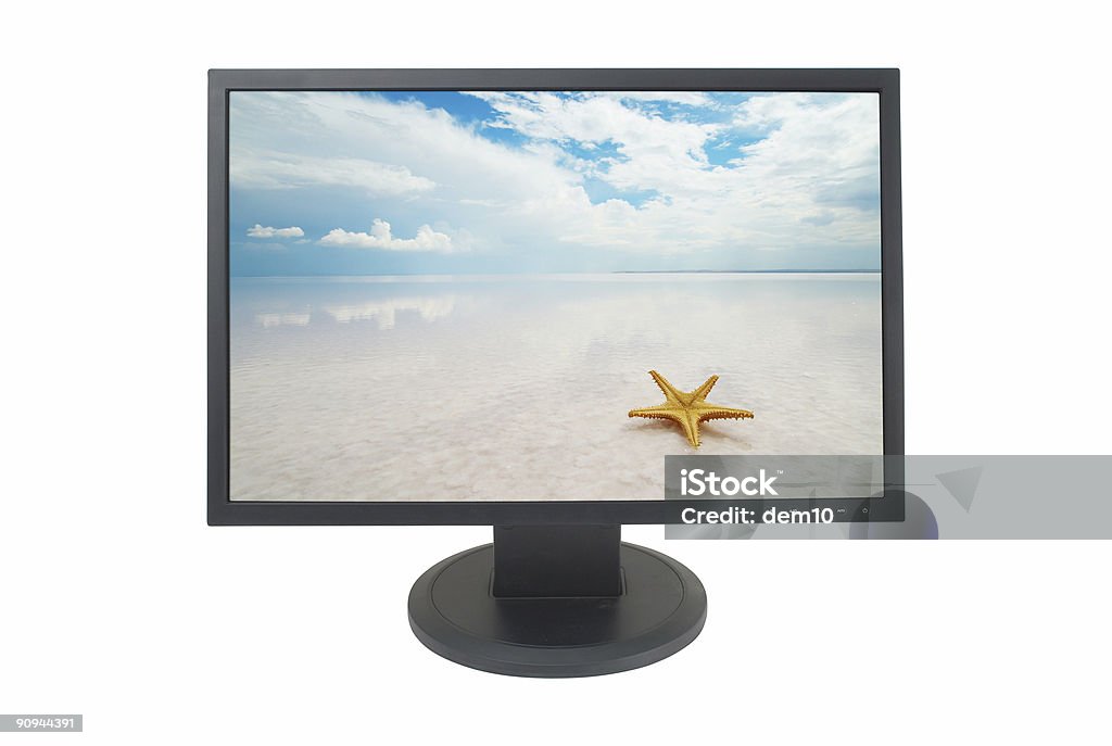 Wide LCD computer monitor  Beach Stock Photo