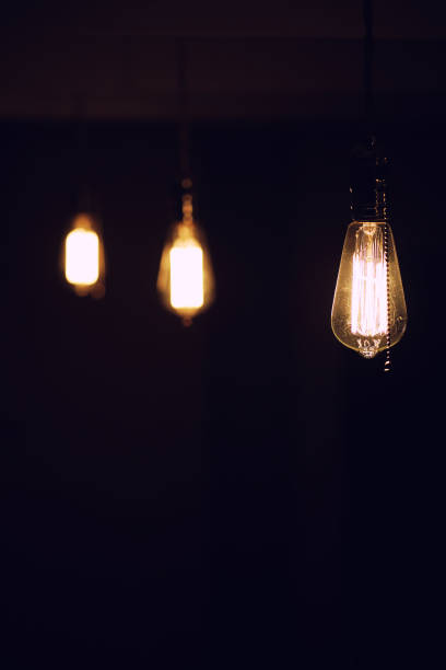 istock Lamps with tungsten filament. Edison's light bulb. Filament fila 909444704