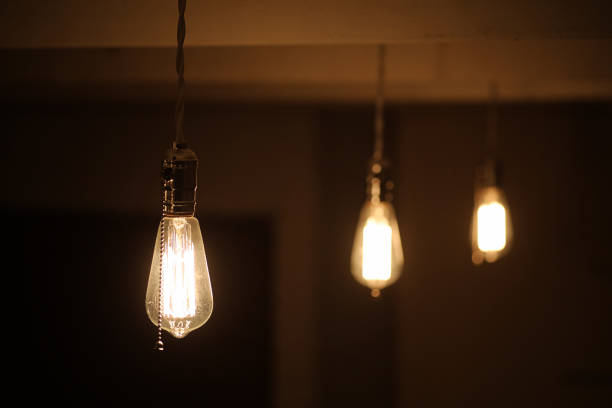istock Lamps with tungsten filament. Edison's light bulb. Filament fila 909444730