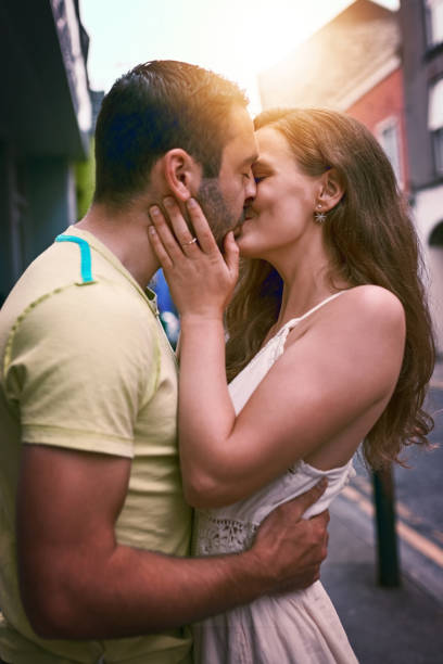 istock Love is too small a word for what they feel 909454606