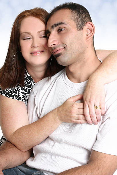 Man comforts distraught woman