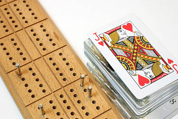 Cribbage board and cards stock photo