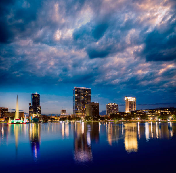 istock Orlando skyline sunset at lake Eola Florida US 909461008