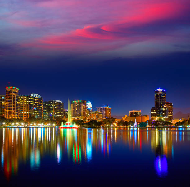 istock Orlando skyline sunset at lake Eola Florida US 909461160