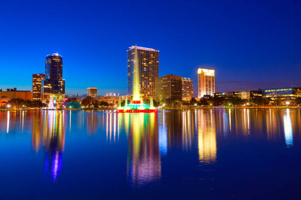istock Orlando skyline sunset at lake Eola Florida US 909461204