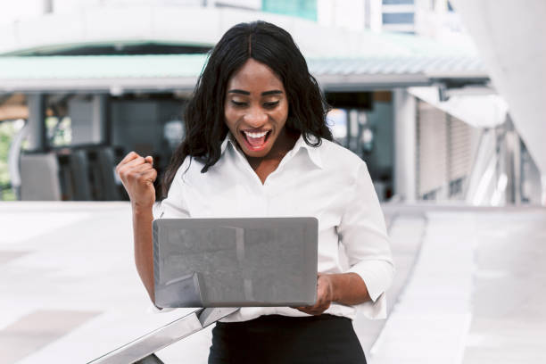 istock African woman working on laptop 909462136