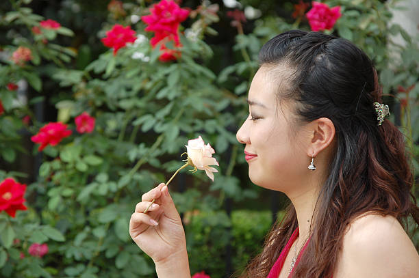 istock girl in rose garden 90946223